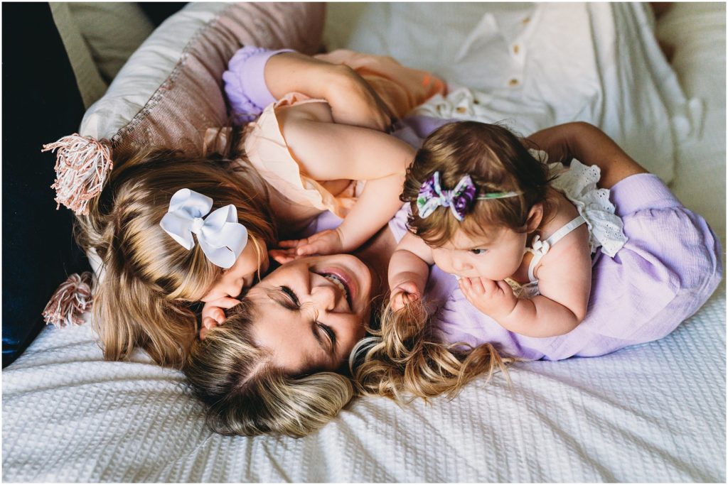 mother and daughters smiling and happy - Sabrina Gebhardt Photography